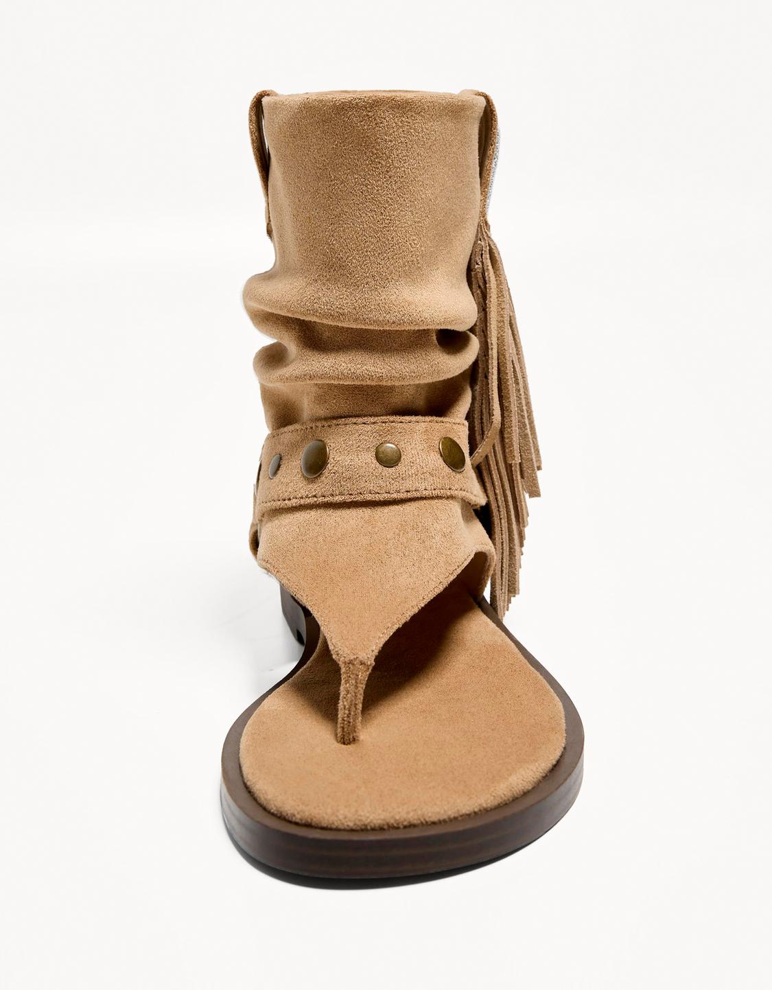 Flat gaiter sandals with fringing