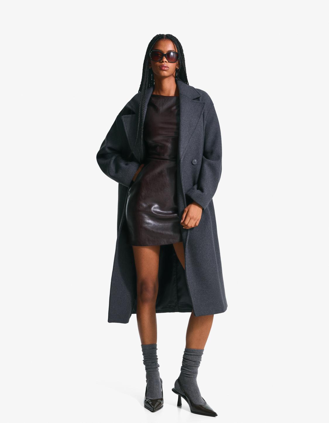Asymmetric leather effect mini dress