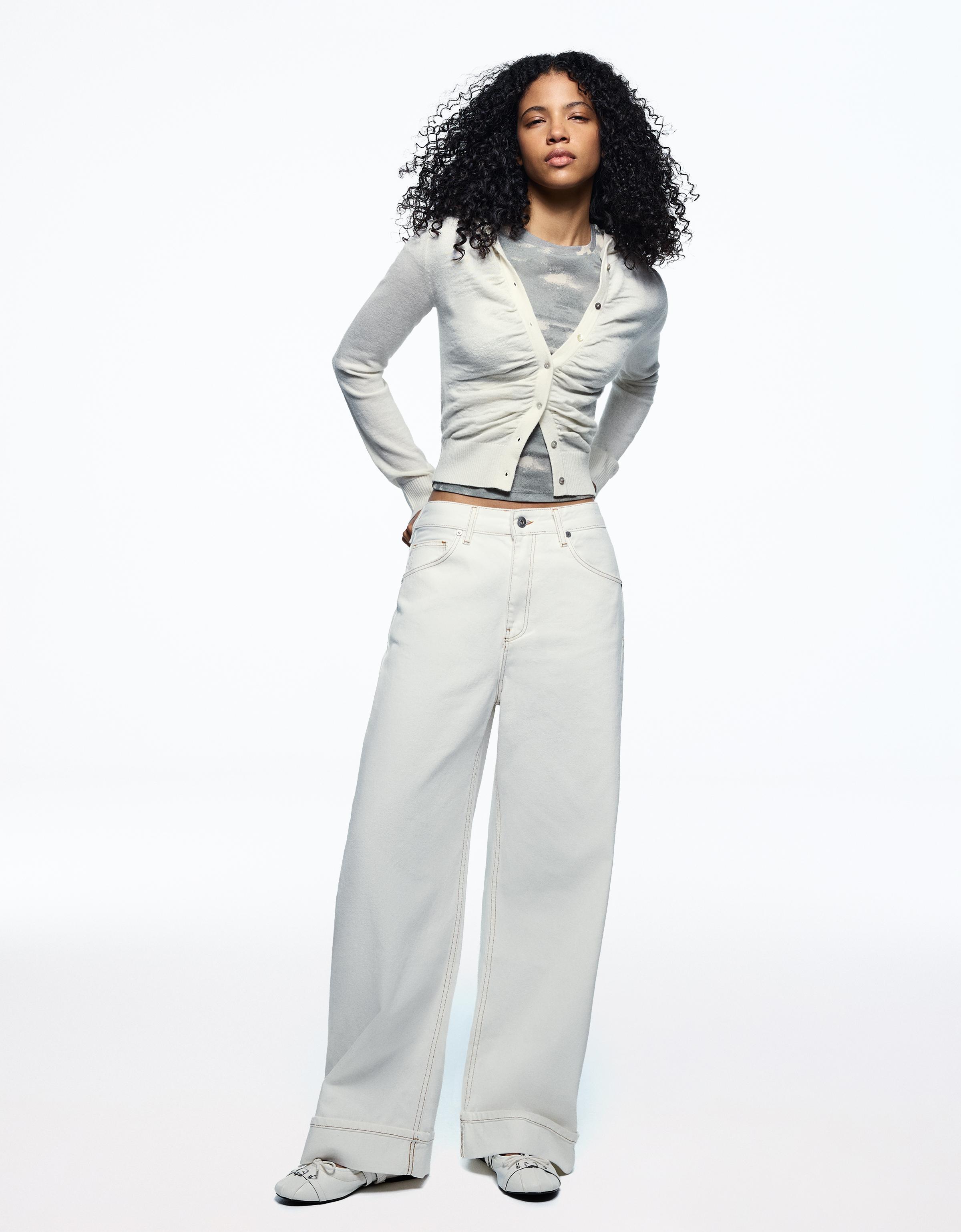 Balloon jeans with back buckle