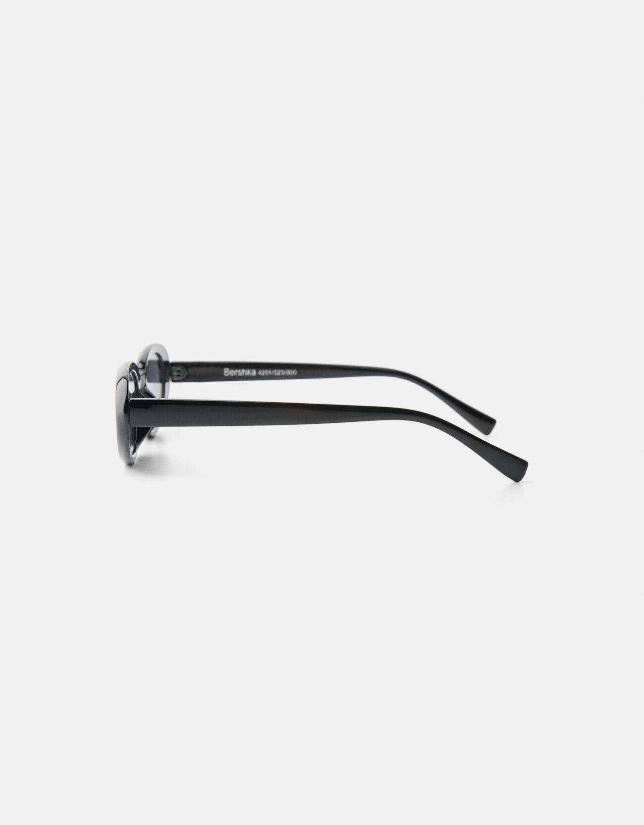 Oval plastic sunglasses — Black