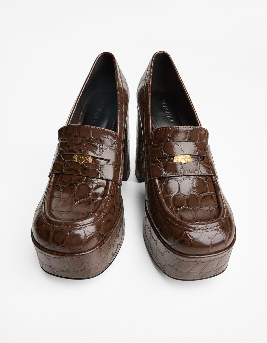 Gehakte mocassin met plateauzool-Bruin