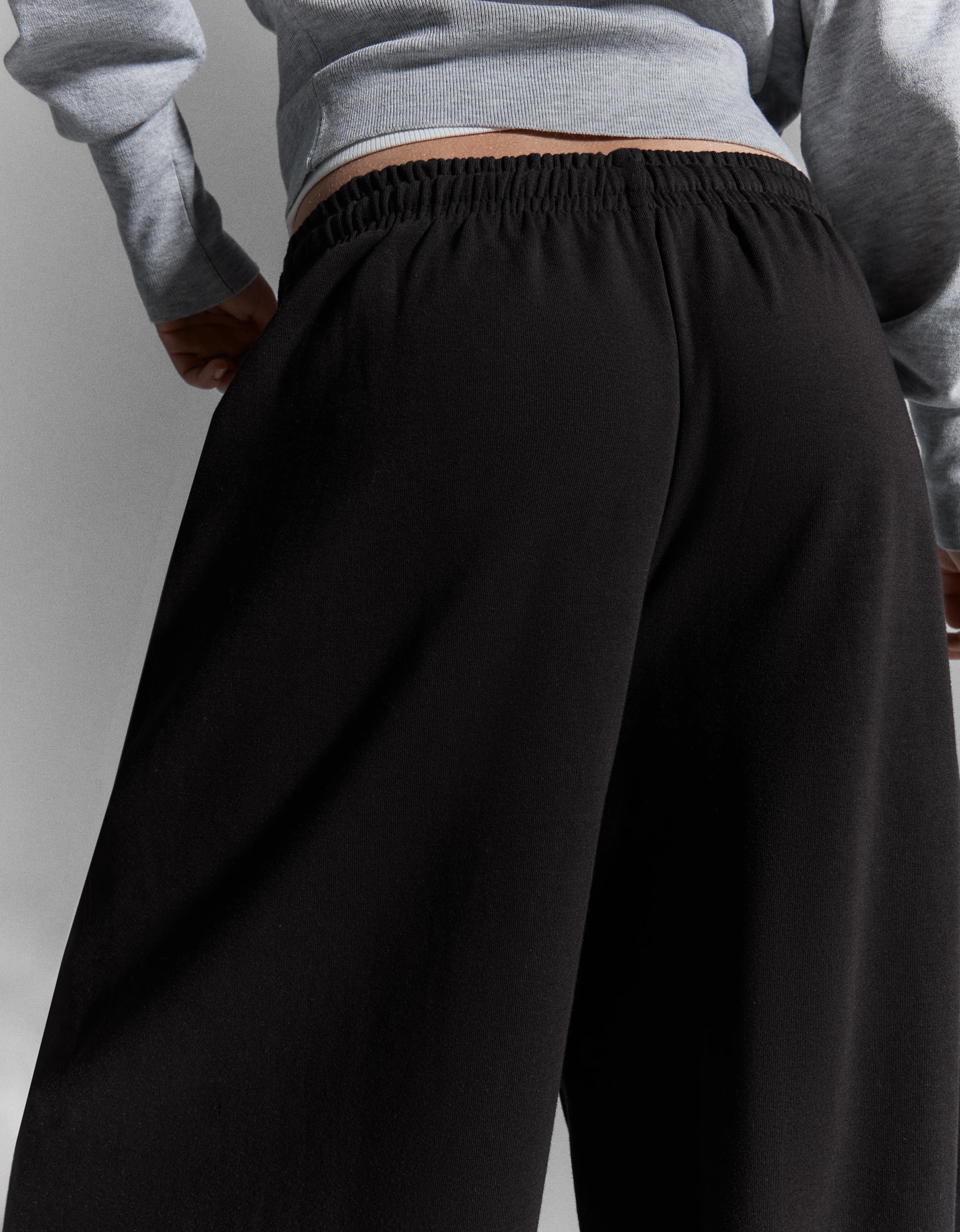 Barrel plush trousers with stoppers — Black