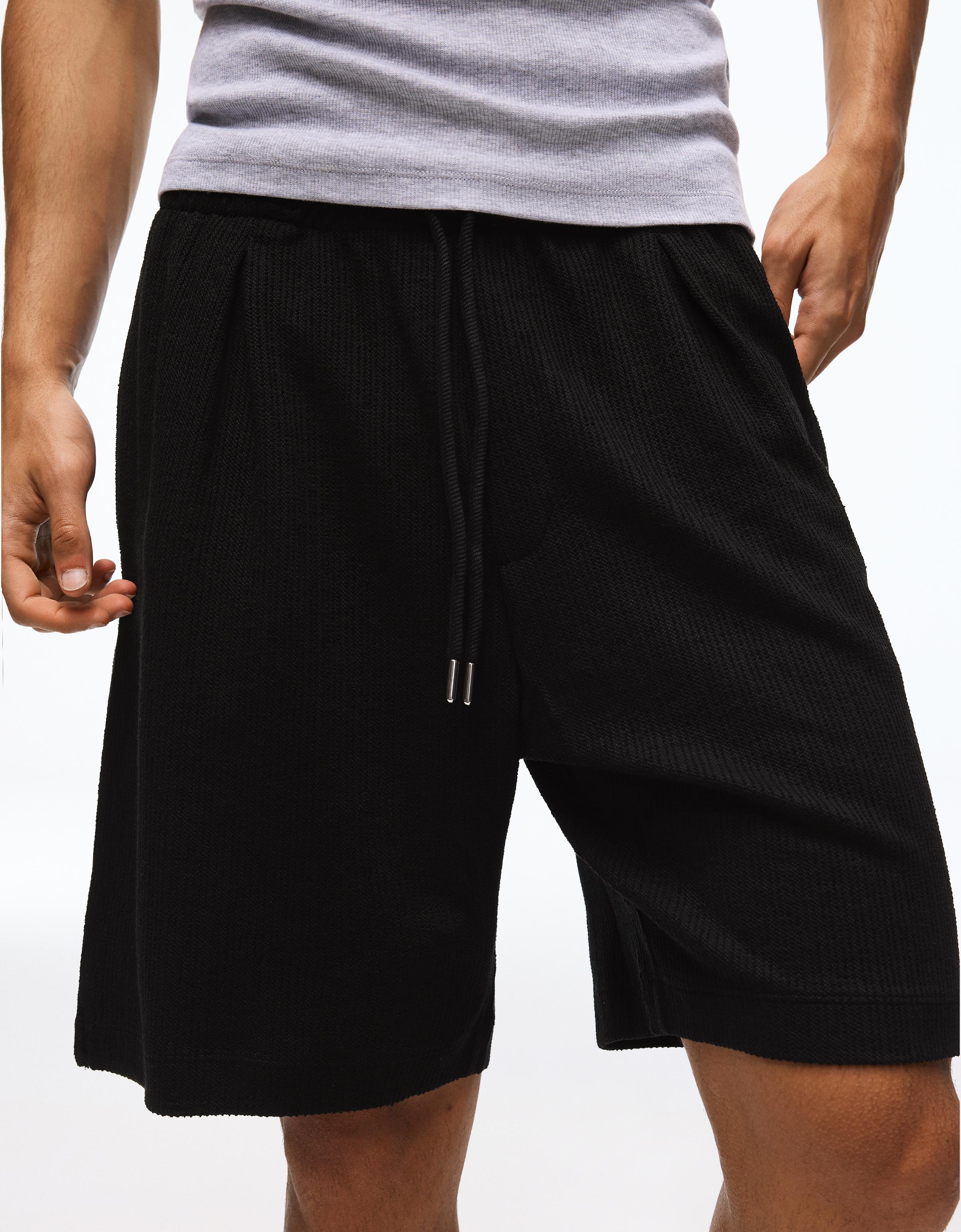 Textured plush Bermuda shorts — Black
