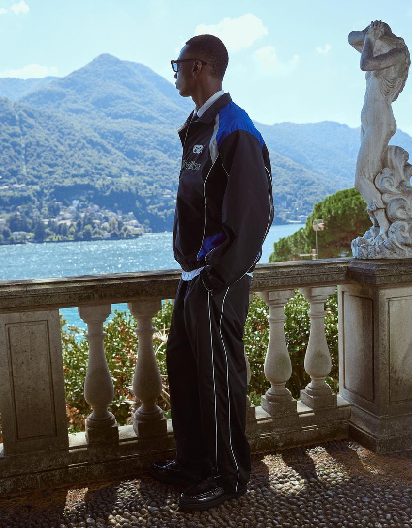 Calças técnicas baggy fit sport-Preto