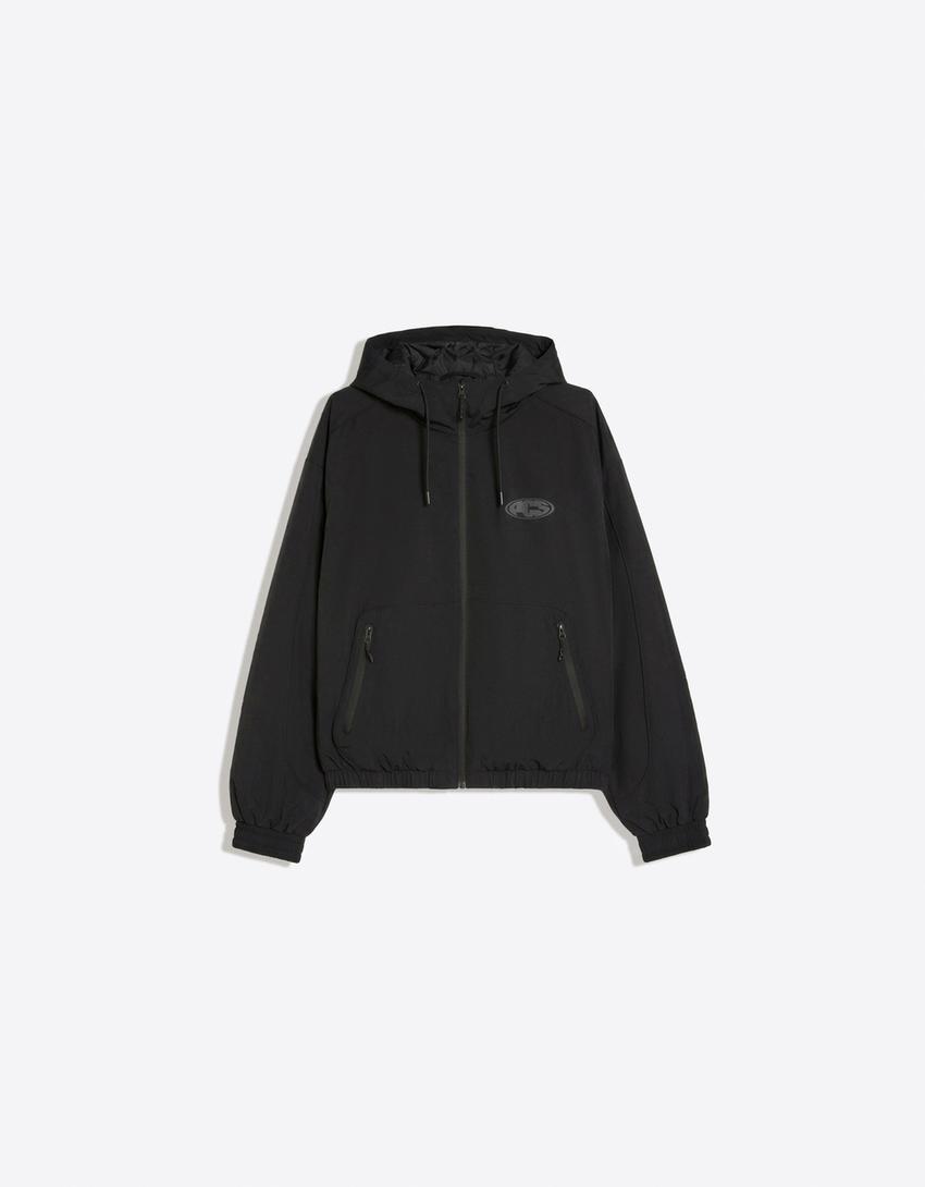 Technische Jacke mit Kapuze-Schwarz