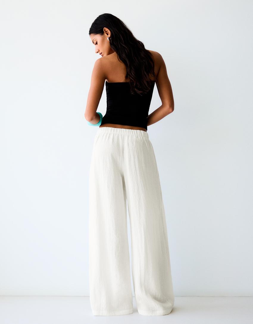 Wide-leg rustic pleated trousers-Off white