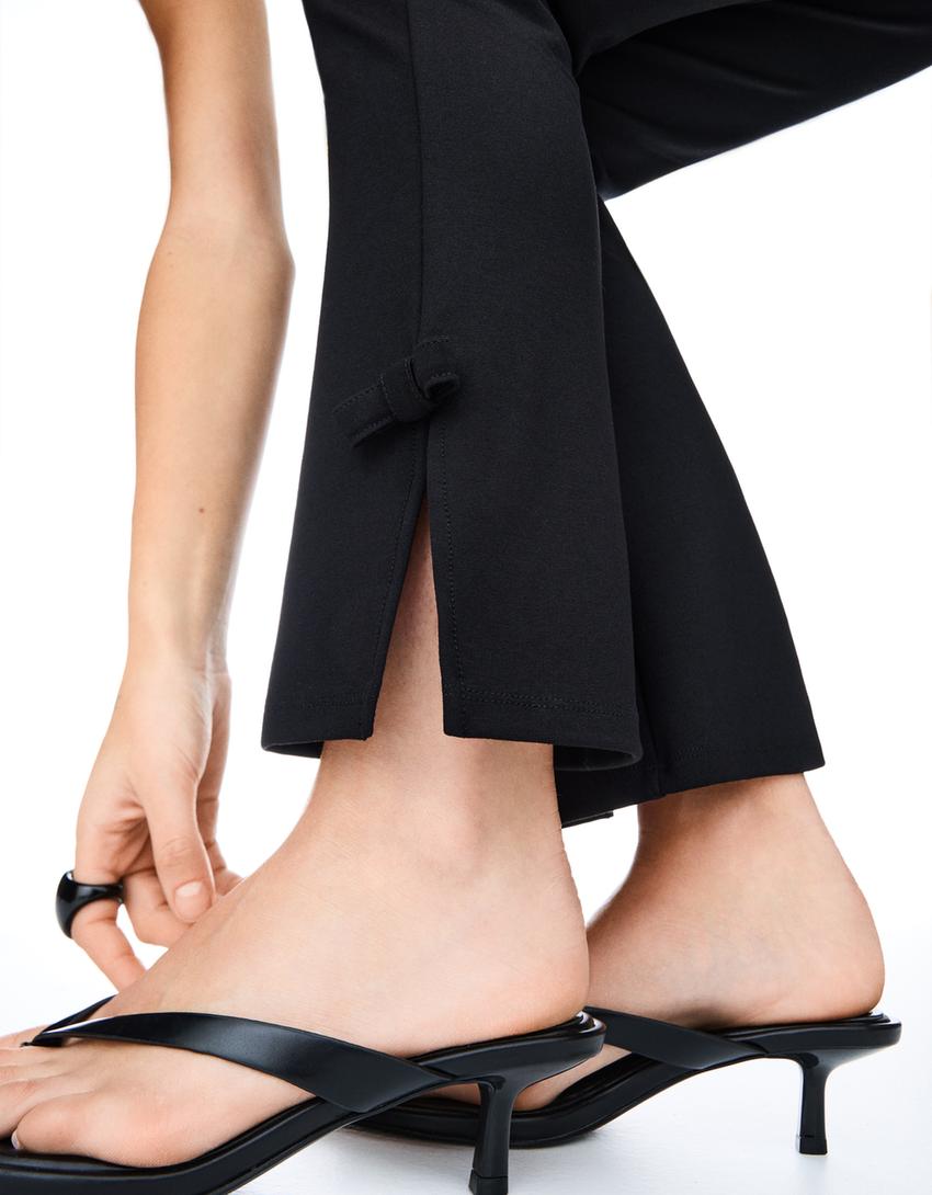 Kick flare pants with bows-Black-2