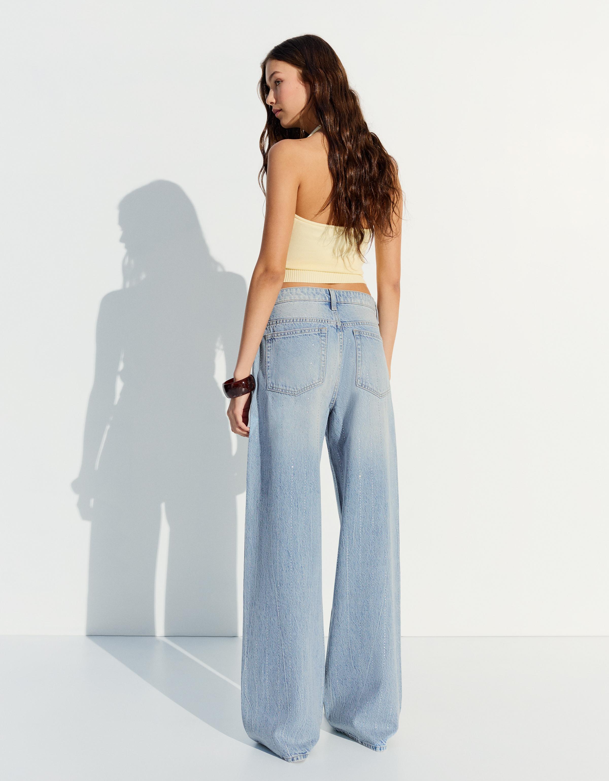 Shimmery wide-leg jeans with crossover waist — Light blue