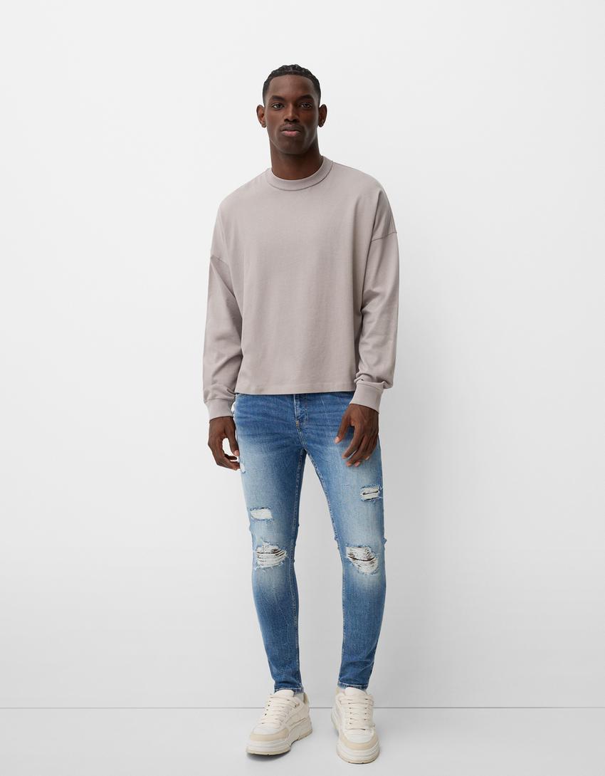 Blugi super skinny fit rupți-Albastru