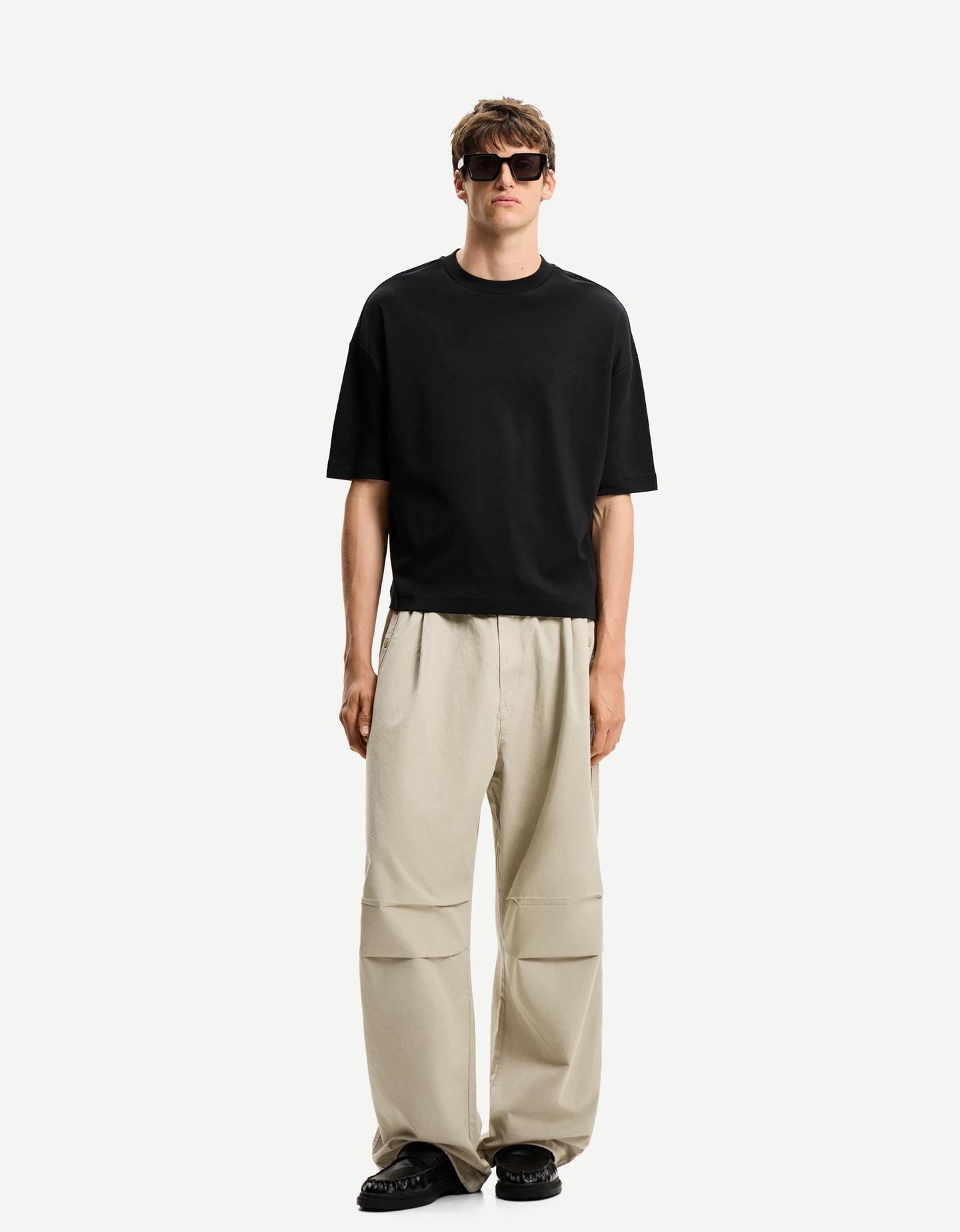 Bershka spodnie parachute super baggy piaskowy