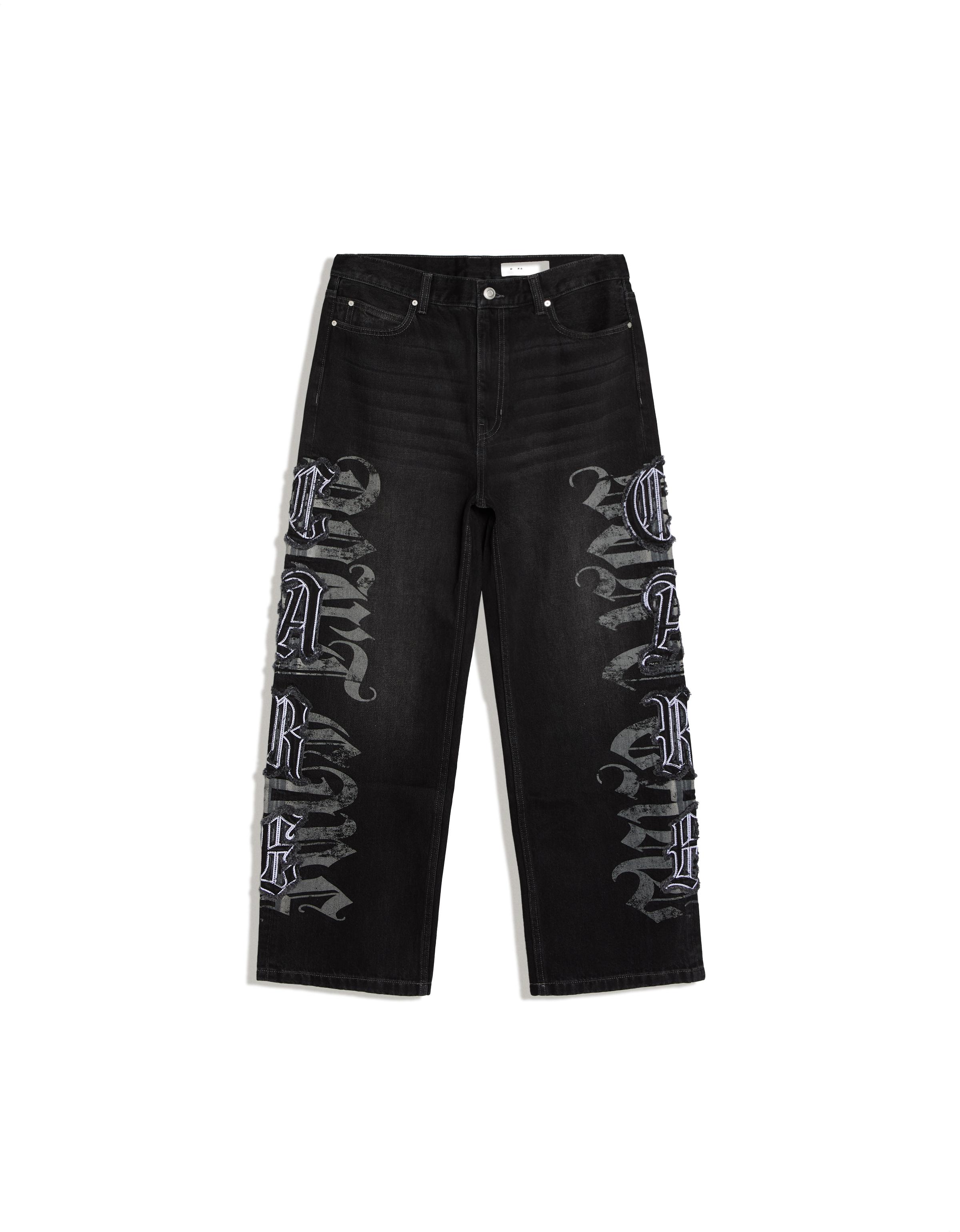 Baggy jeans with star patches — Black
