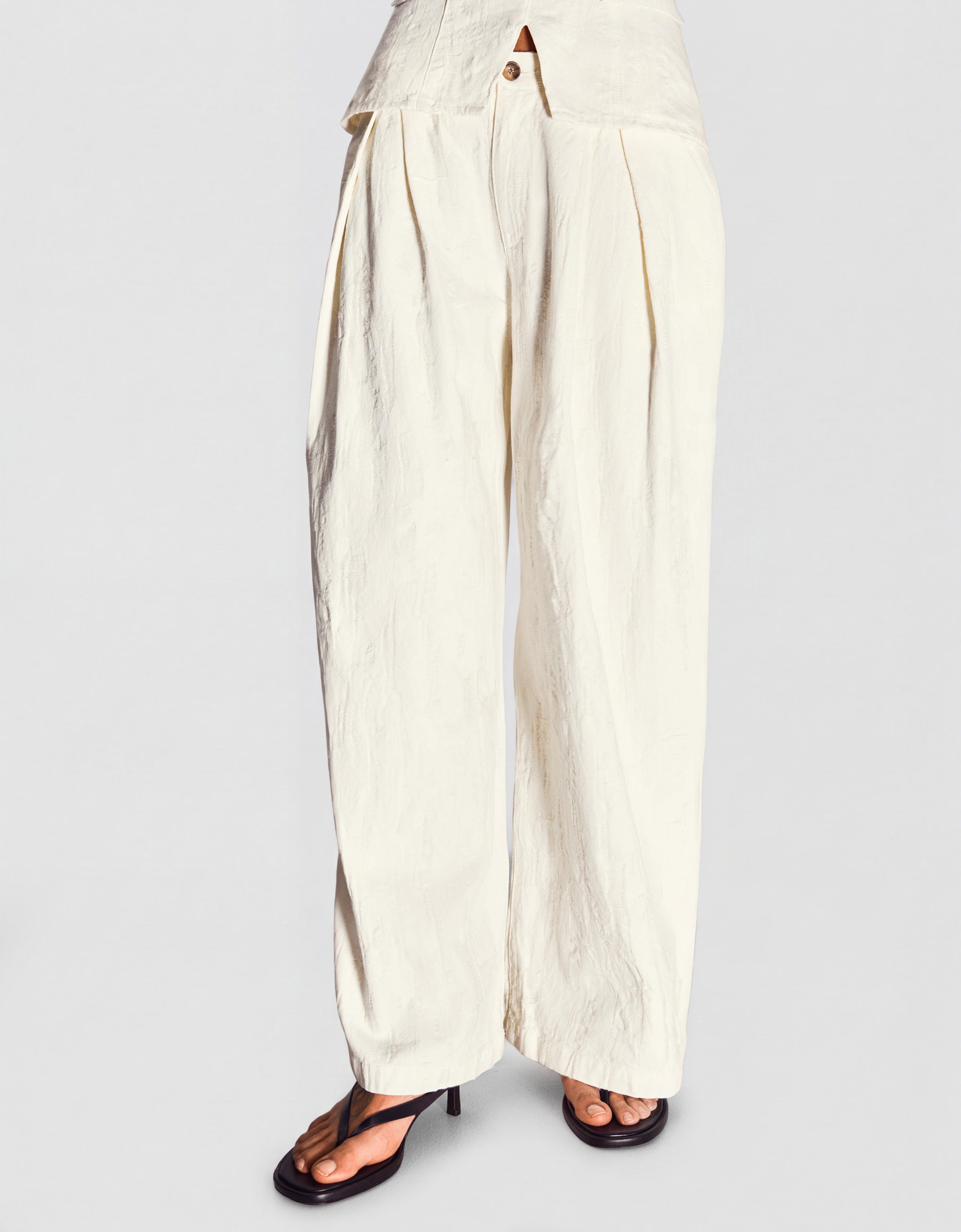 Düşük bel pensli geniş paça jean - Görsel 23