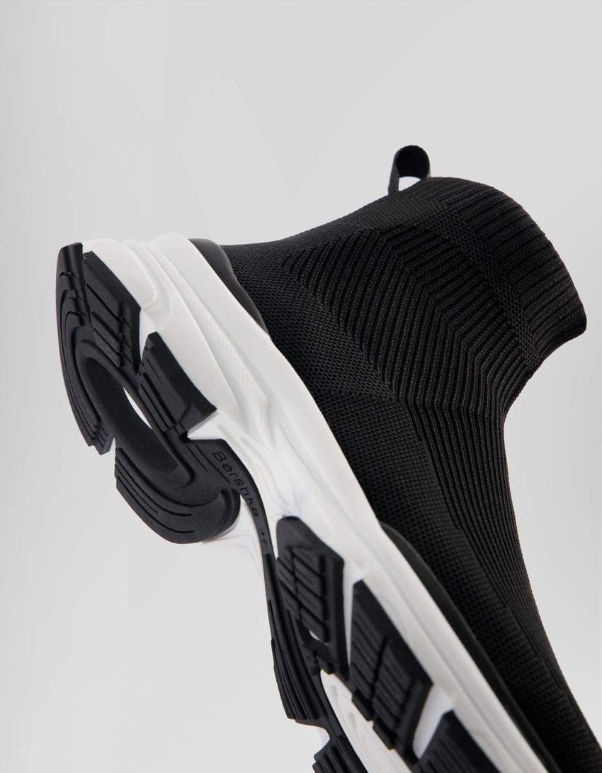 حذاء رياضي برقبة عالية من قماش محاك-أسود