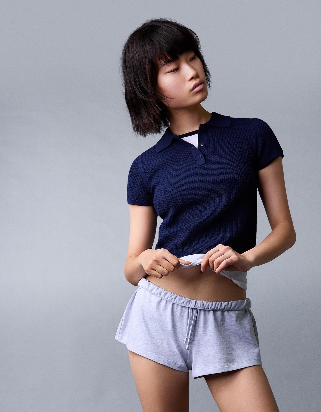 Textured polo collar short sleeve sweater