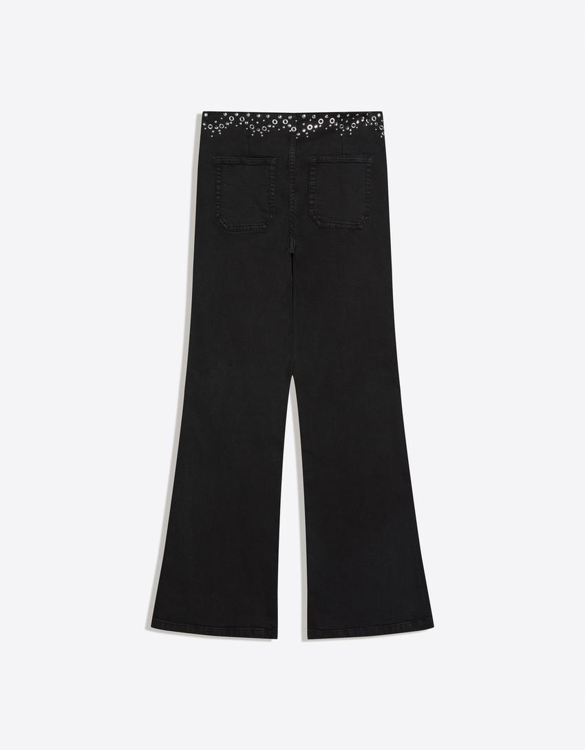 Pantalón cintura tachas-Negro