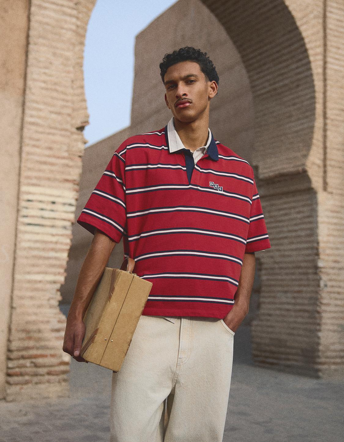 Short sleeve varsity polo shirt with patch