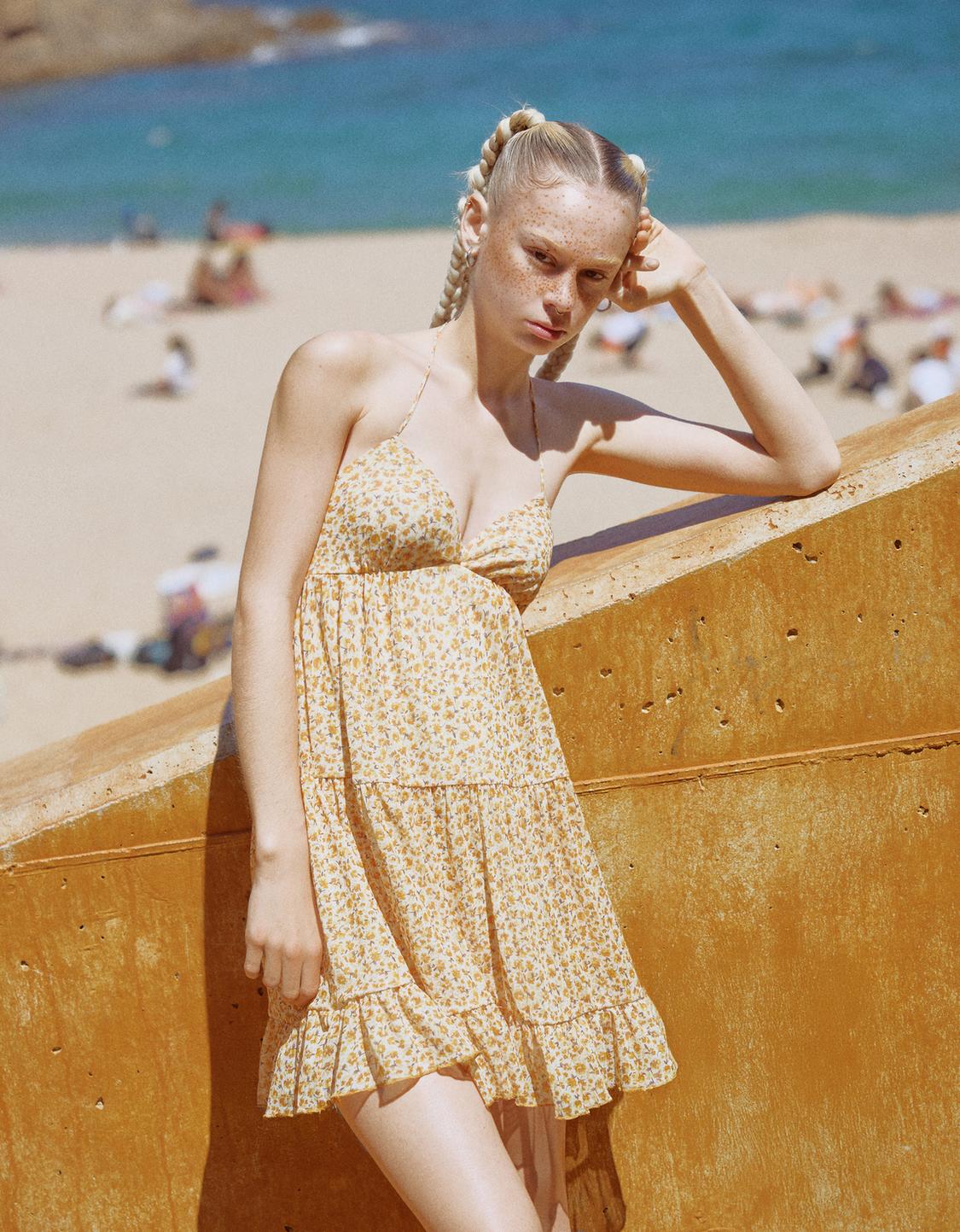 Mini dress with ruffled straps