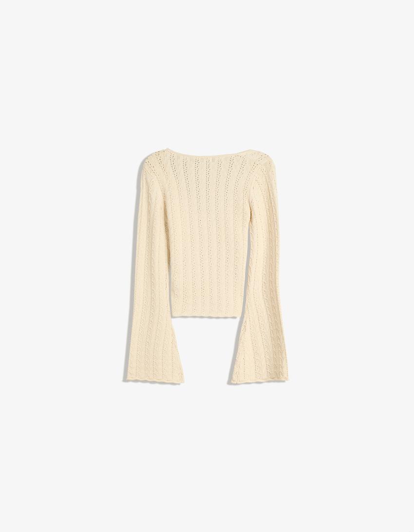 Textured sweater with ring-Cream