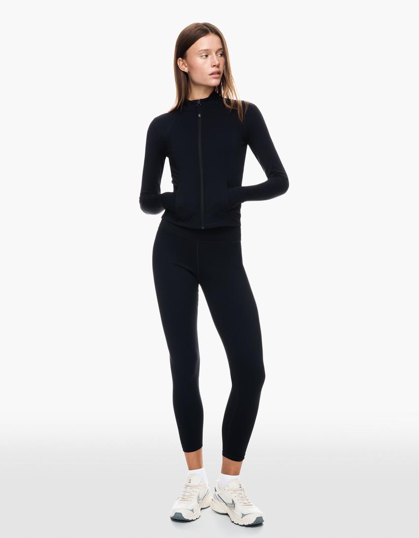 Sneldrogende en ademende sweater met rits-Zwart