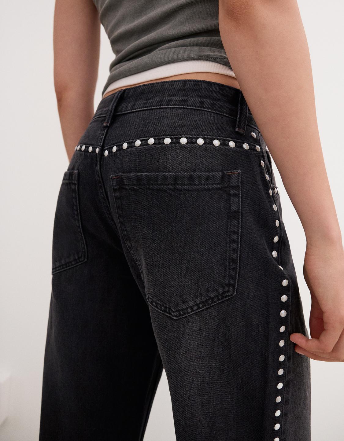 Ripped wide-leg jeans with studs