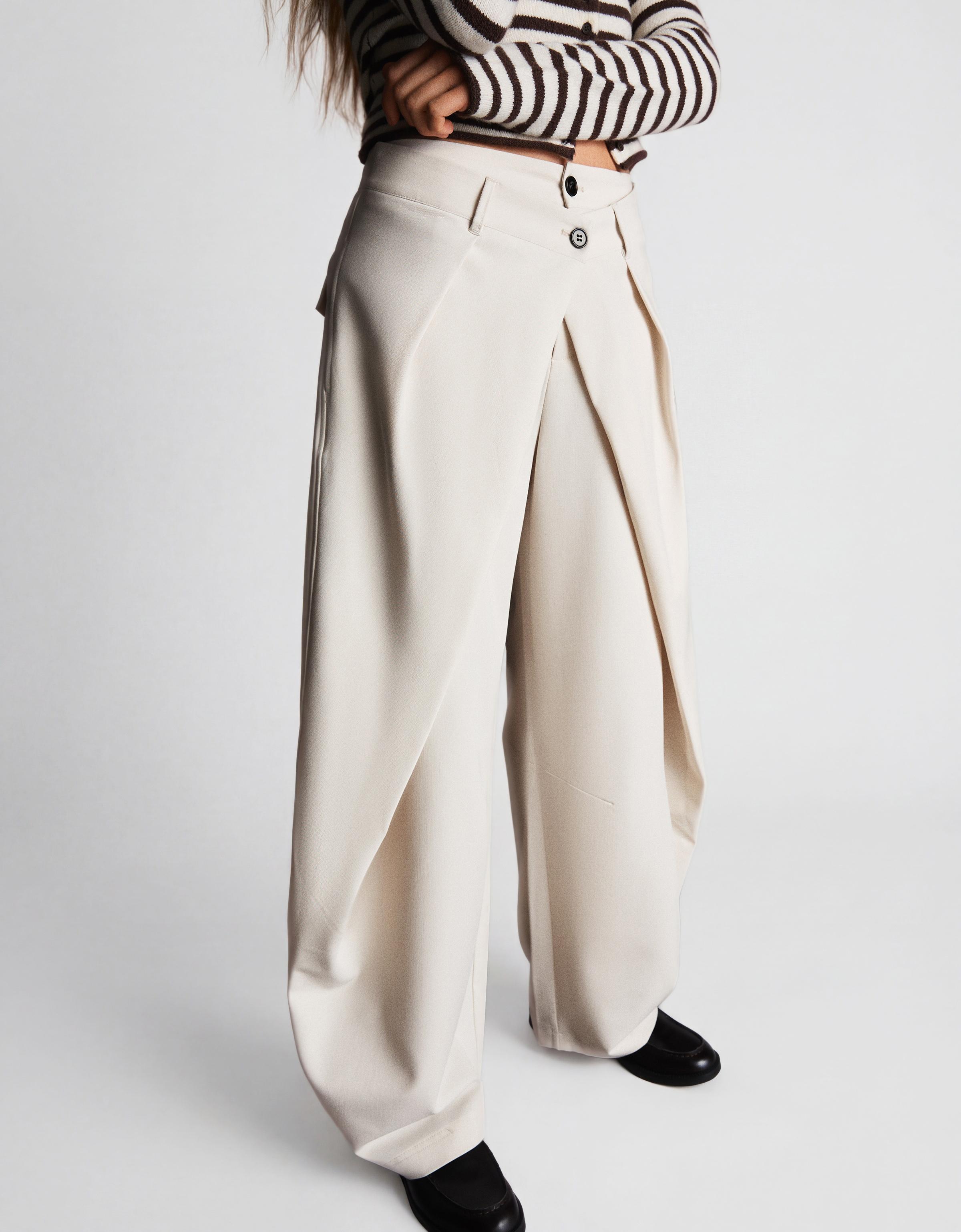 Pleated double-button trousers — Cream