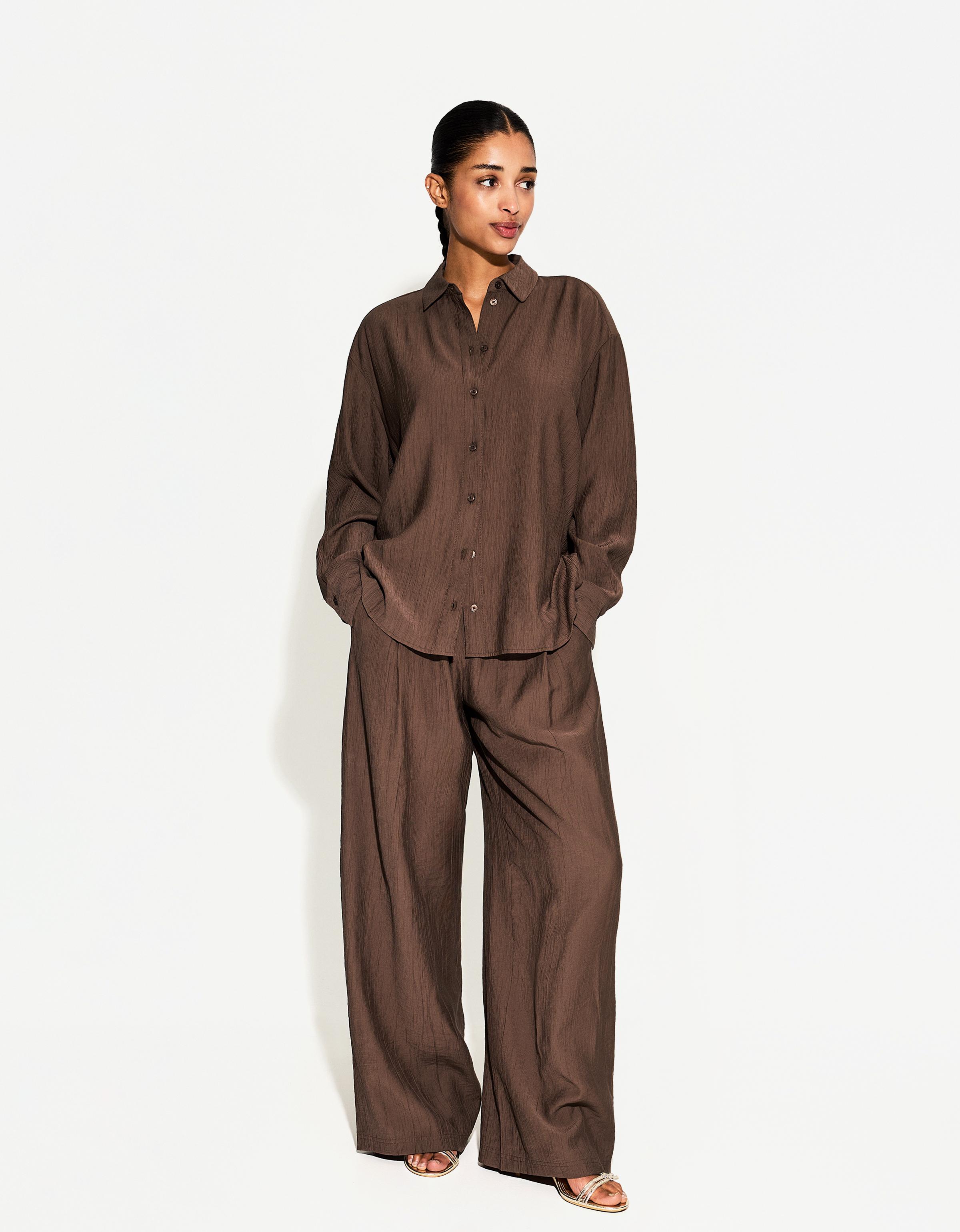 Flowing wide-leg textured trousers with drawstring — Brown