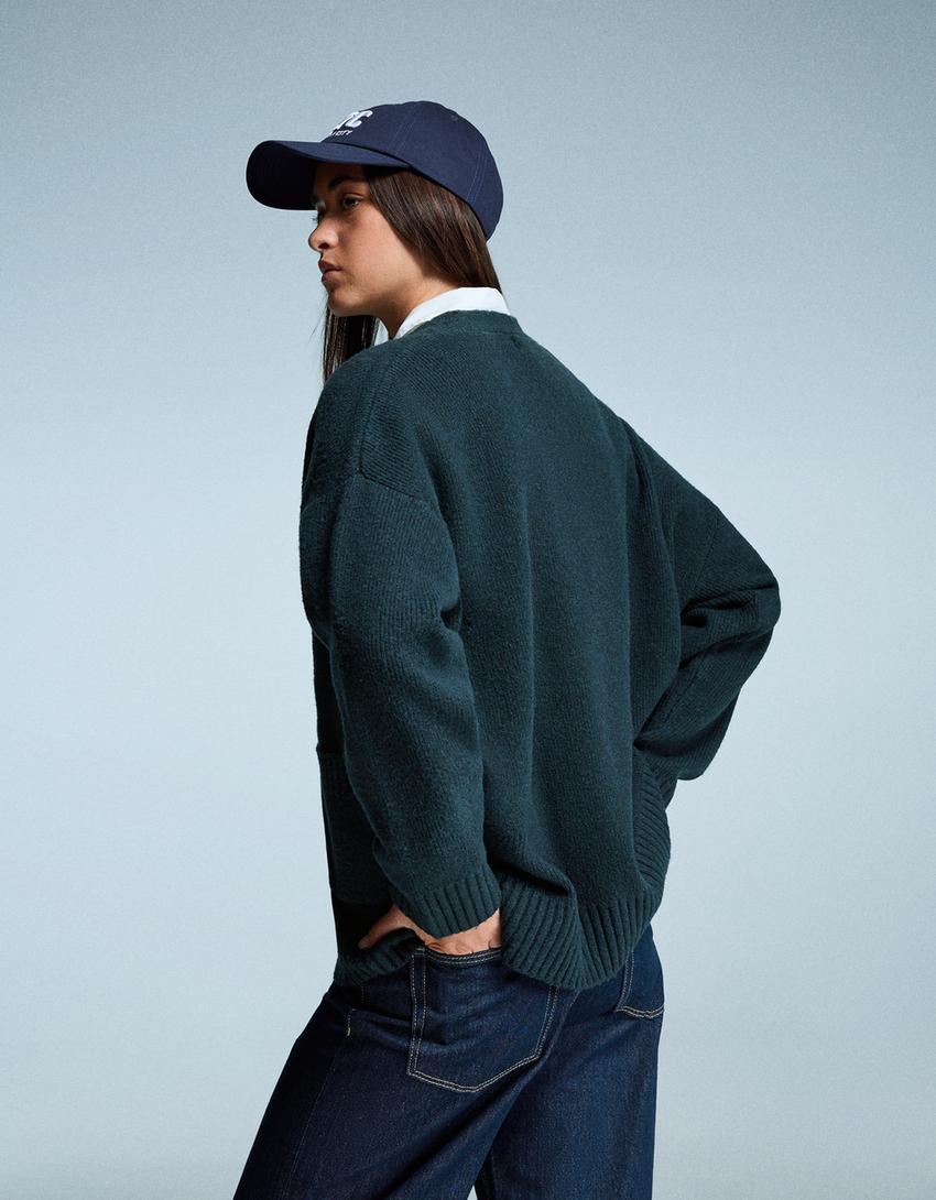 Vest met V-hals en knopen-Blauw