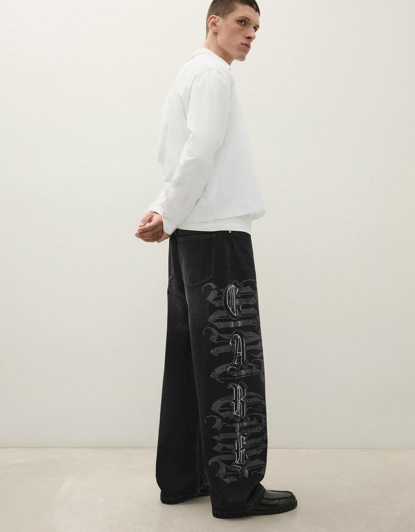 Baggy jeans with star patches-Black