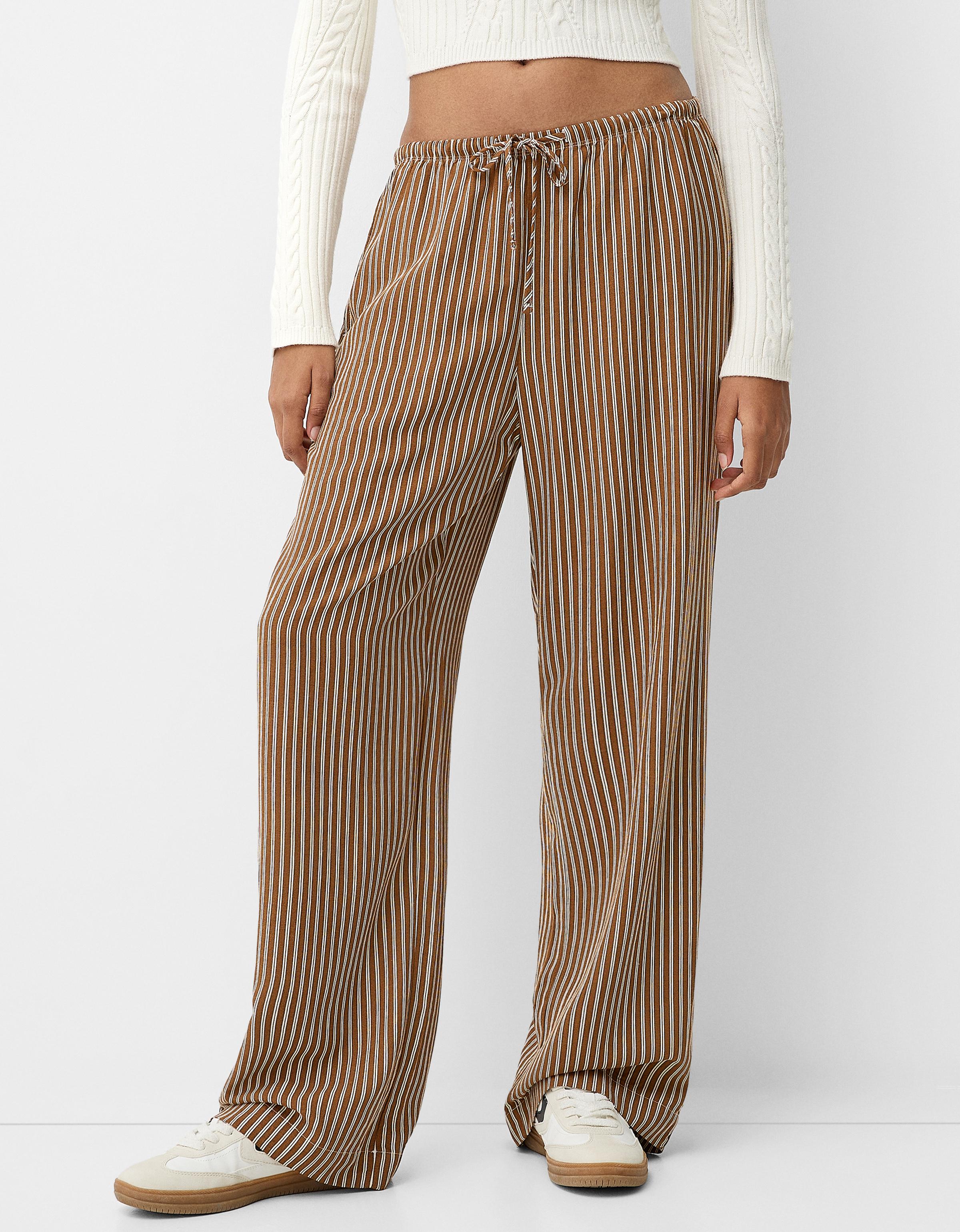 Straight leg striped trousers with elasticated waist Women Bershka