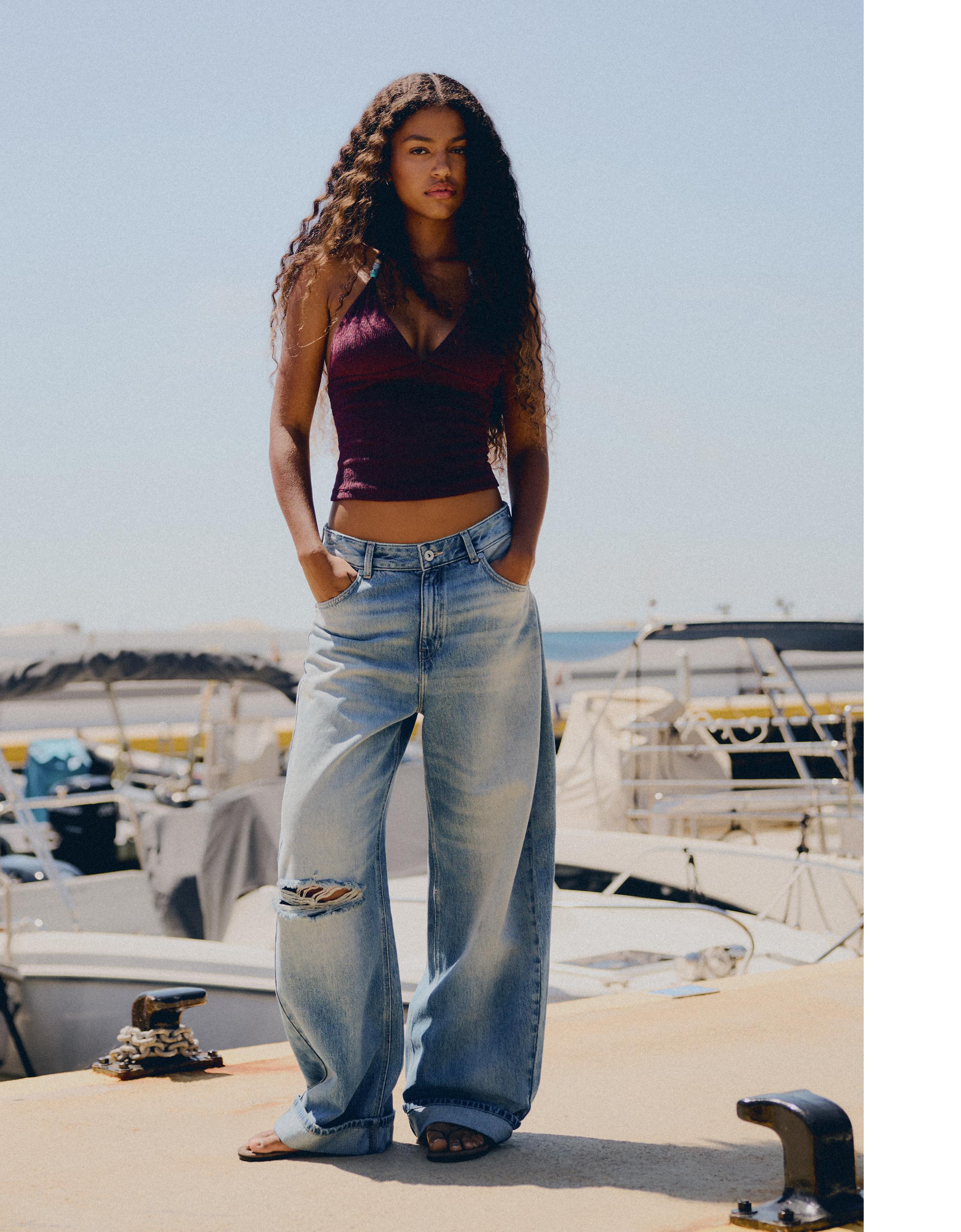 Ripped balloon fit jeans with back buckle — Light blue