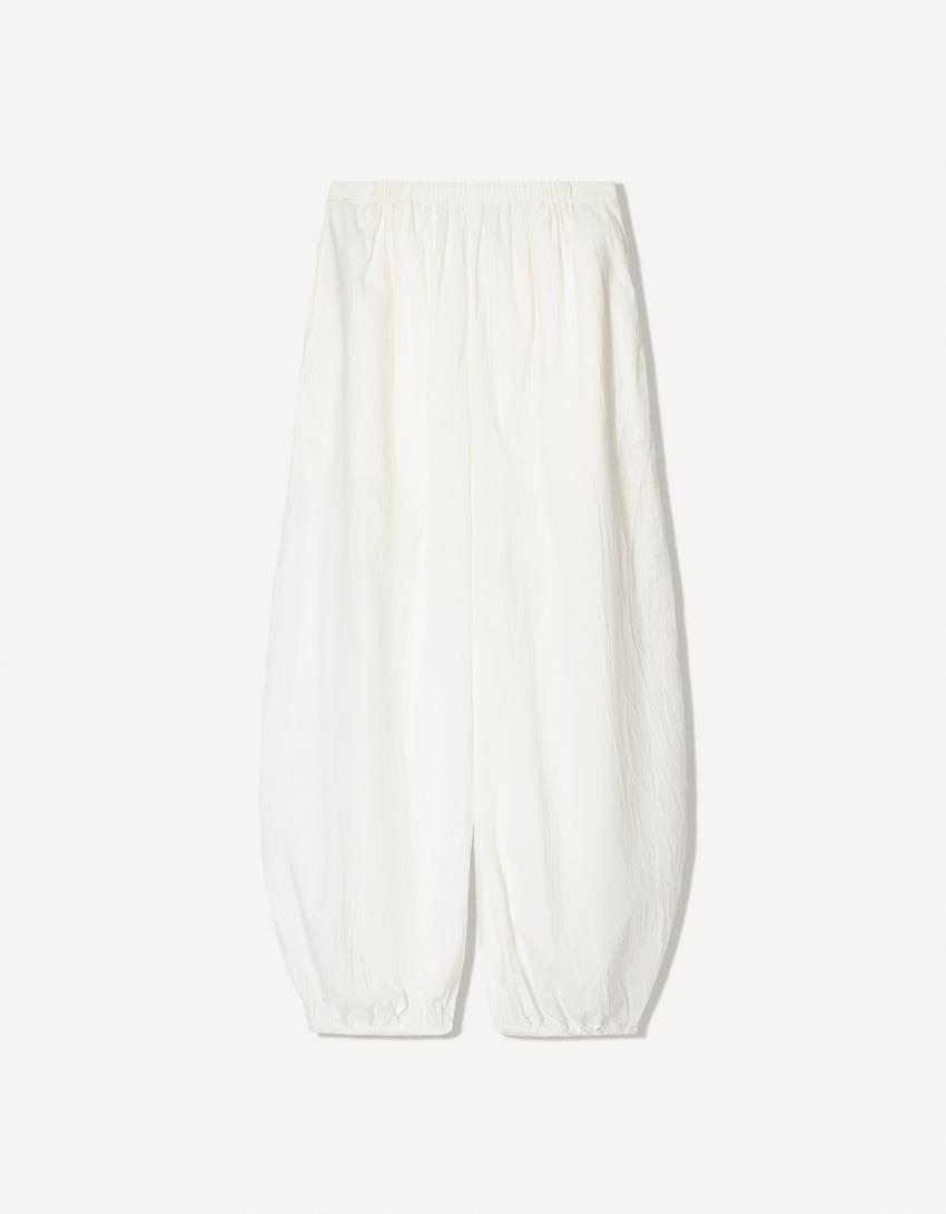 Conjunto top e calças-Conjunto top e calças