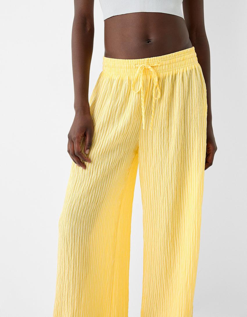 Striped wide-leg creased-effect trousers-Yellow-3