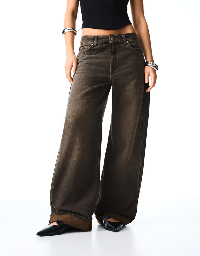 Balloon jeans with back buckle and rips-Black