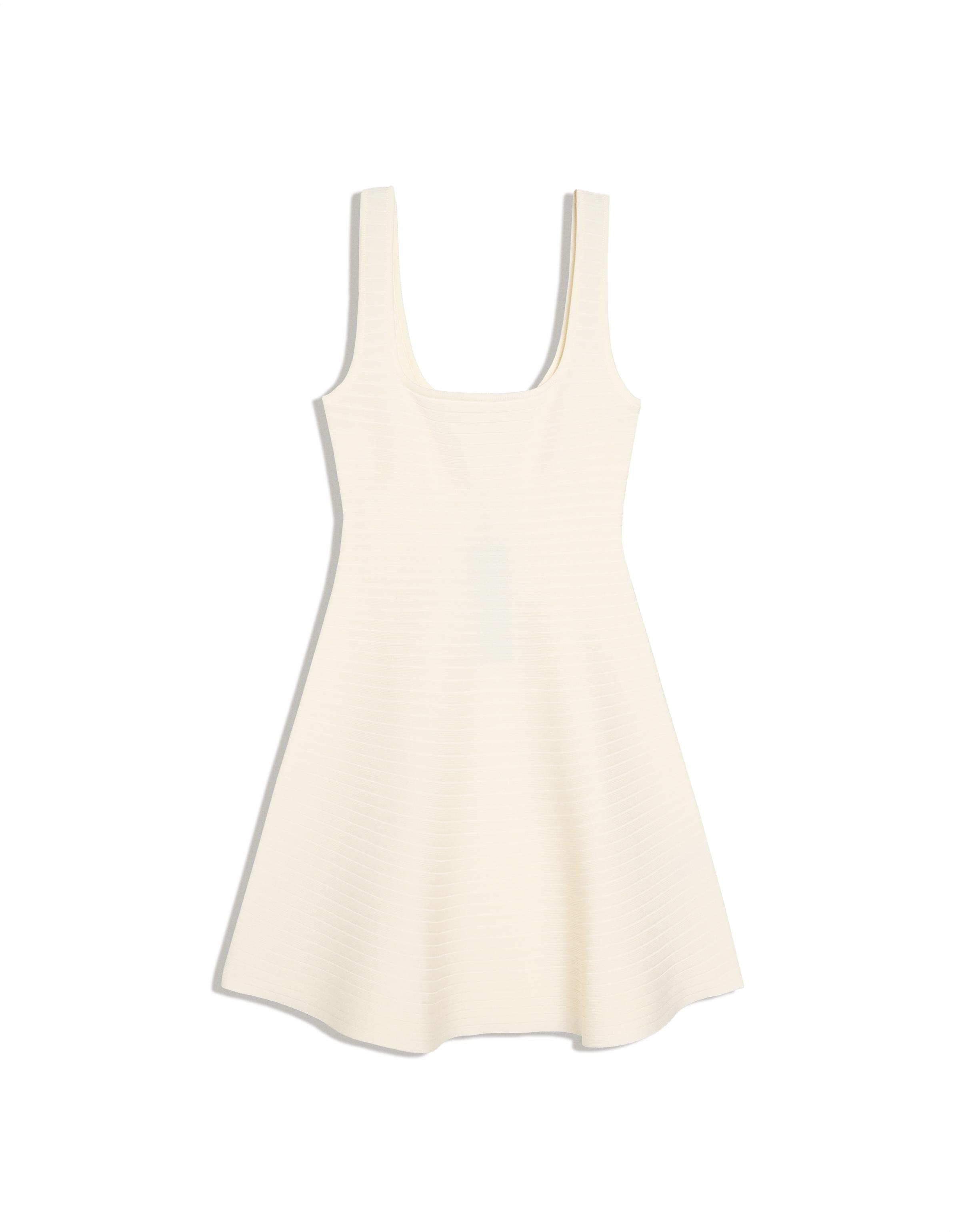 Knitted mini dress with flared skirt — Cream