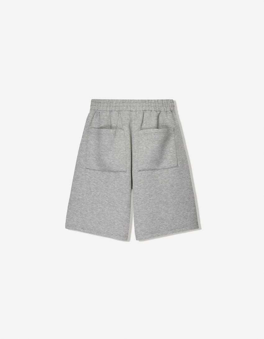 Oversize neoprene-effect Bermuda shorts