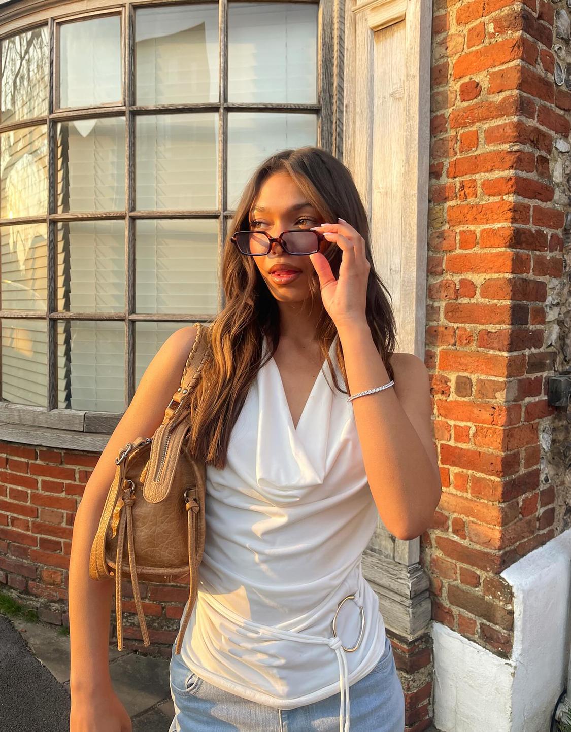 Asymmetric draped top with ring detail