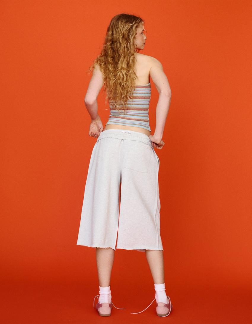 Bandeau-Top mit metallisierten Streifen-Hellblau
