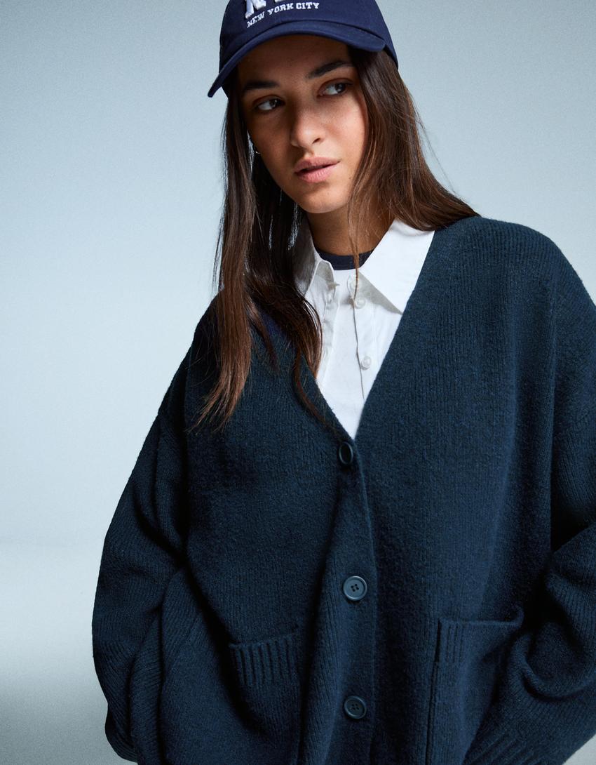 Vest met V-hals en knopen-Blauw