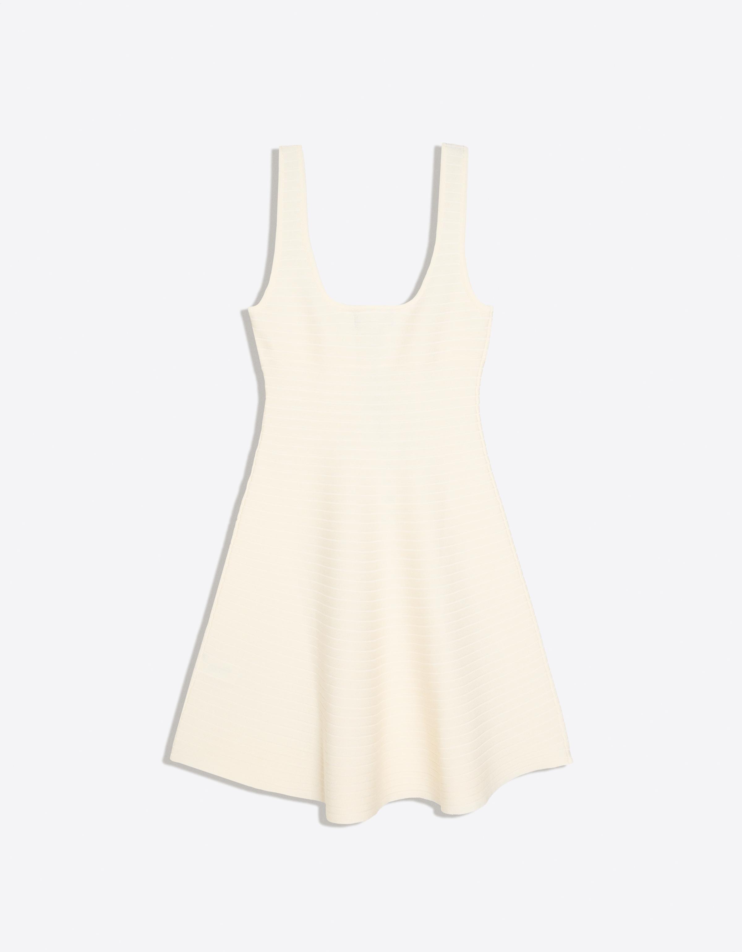 Knitted mini dress with flared skirt — Cream
