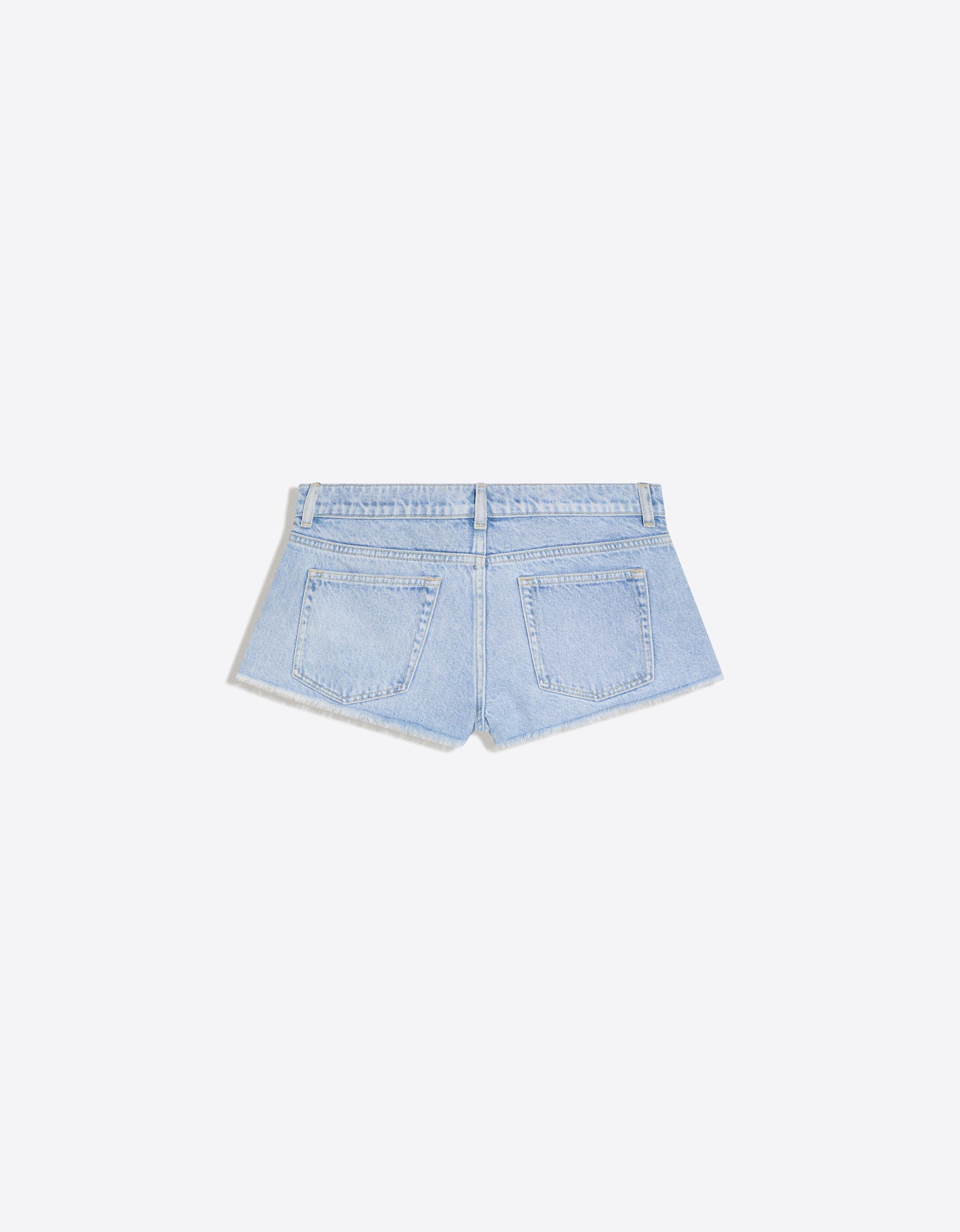 Denim mini shorts with frayed hem — Light blue