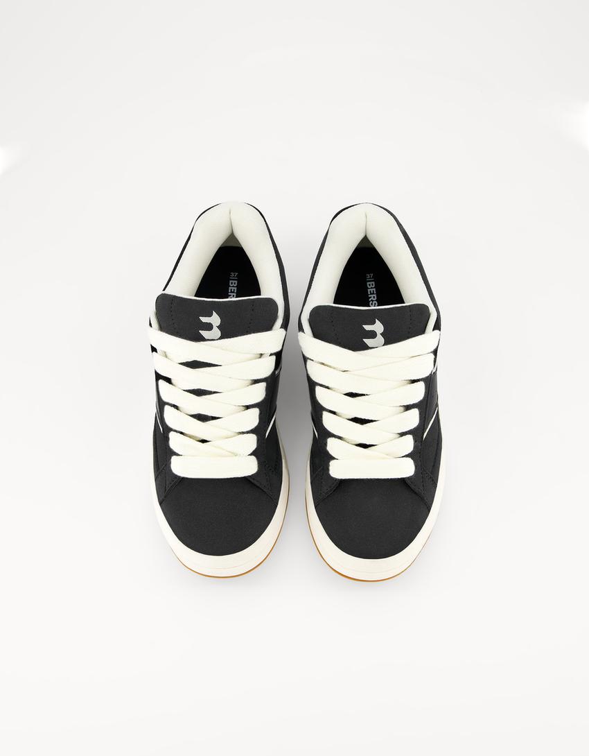 حذاء رياضي متزلج-أسود