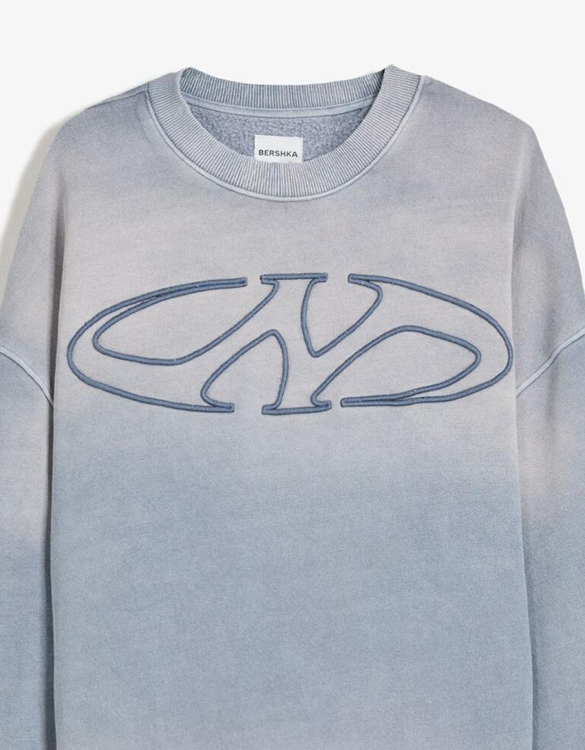 ოვერსაიზი გახუნებული ეფექტის მოსცმელი პერანგი-ღია ლურჯი