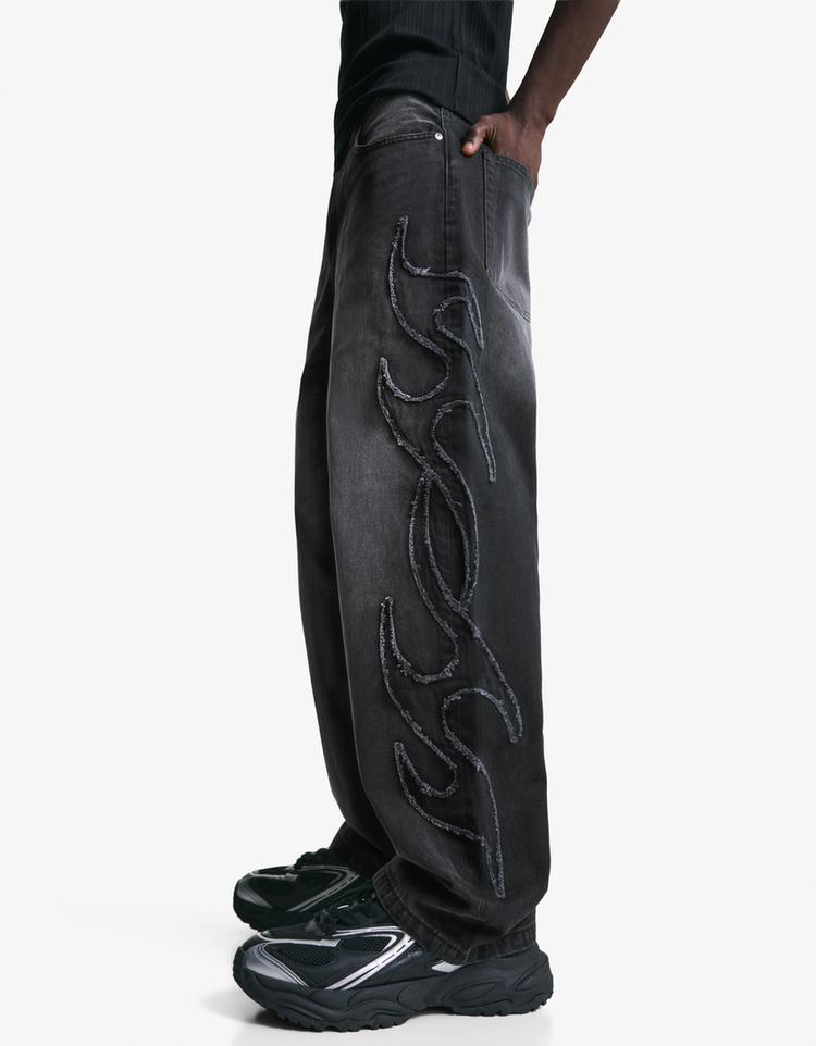 Baggy jeans with patch