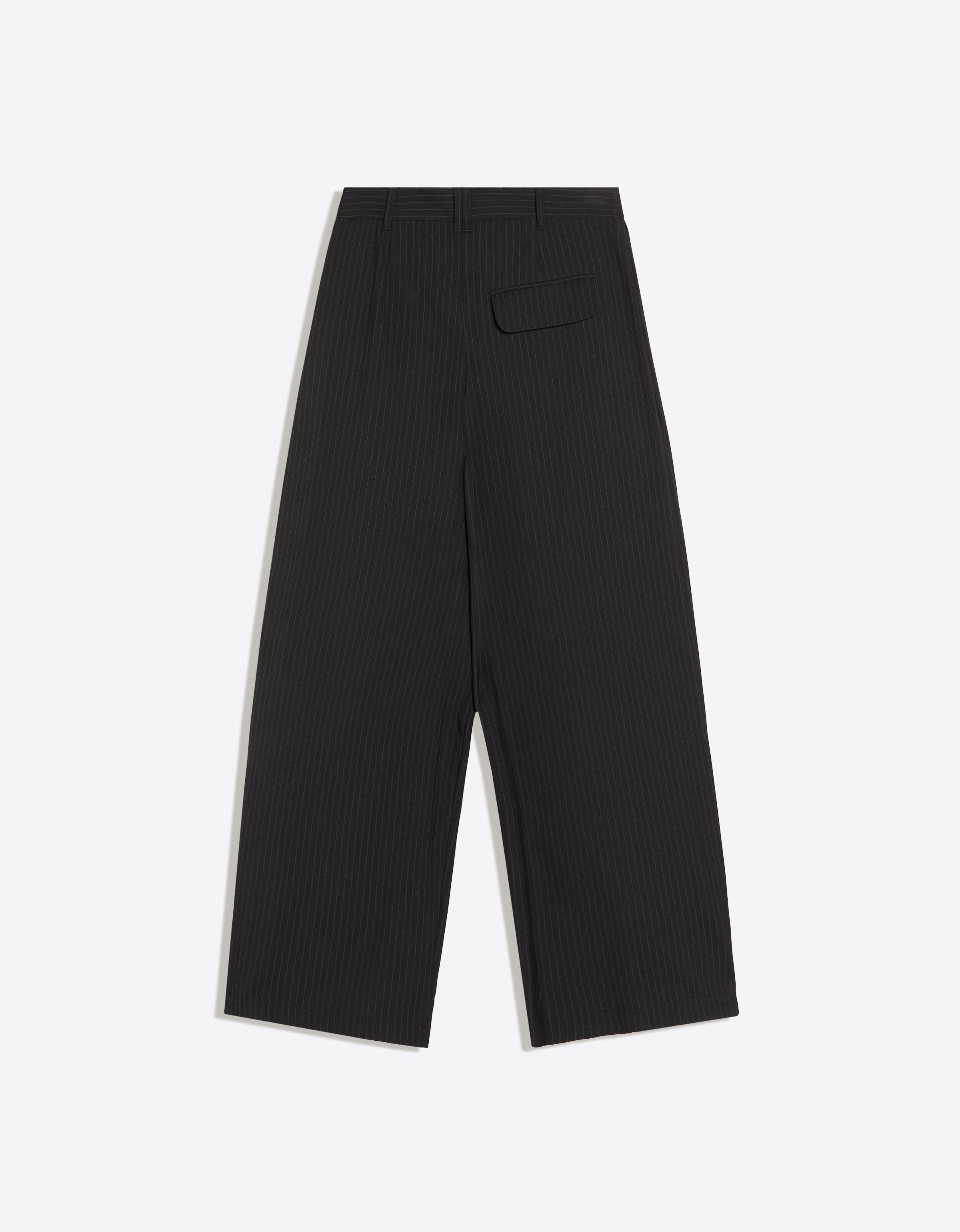 Balloon trousers with pleats and buttons