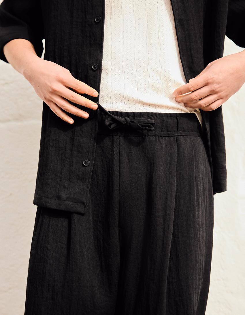 Rustic baggy trousers-Black
