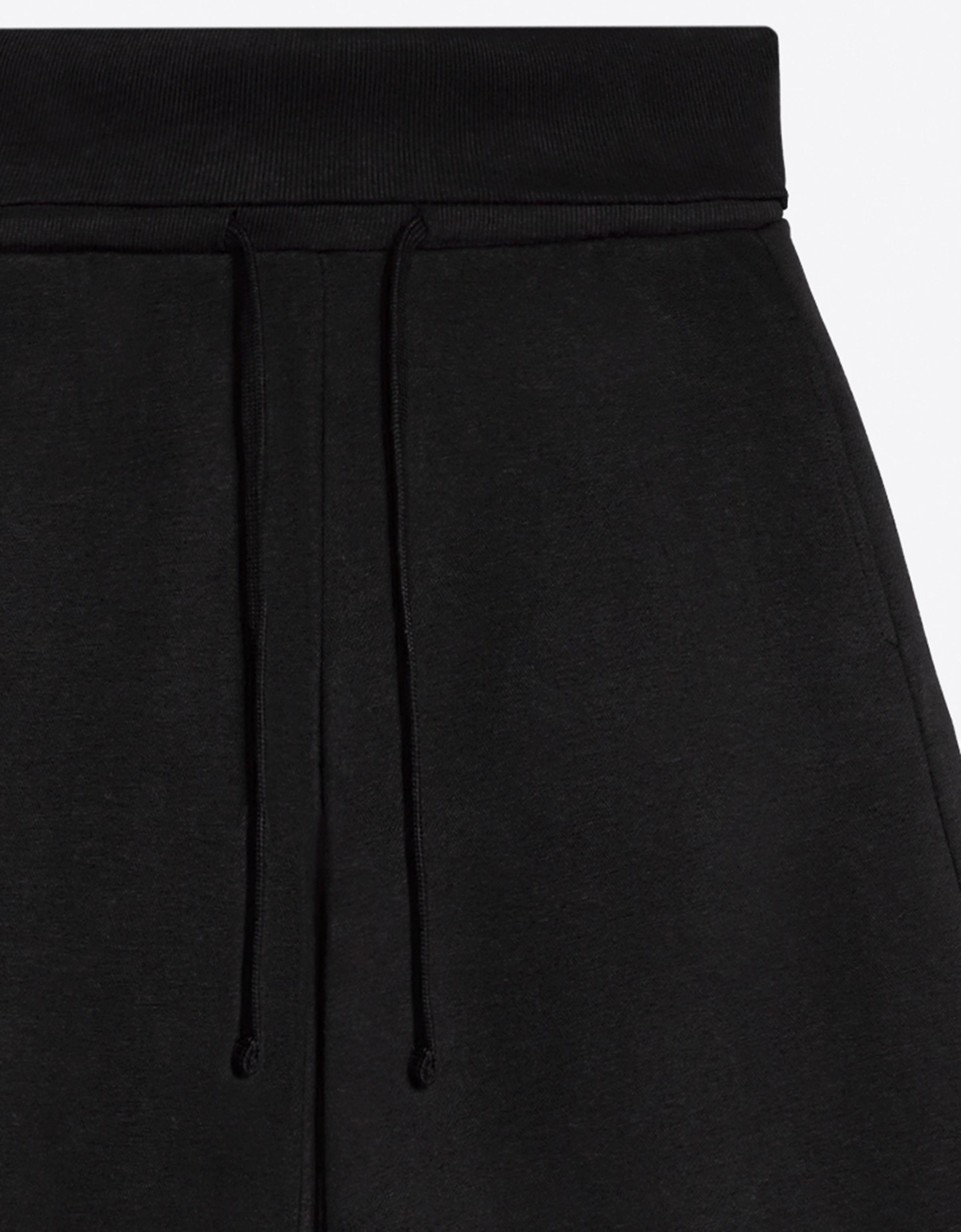 Barrel-leg jersey trousers with fold-over waist — Black