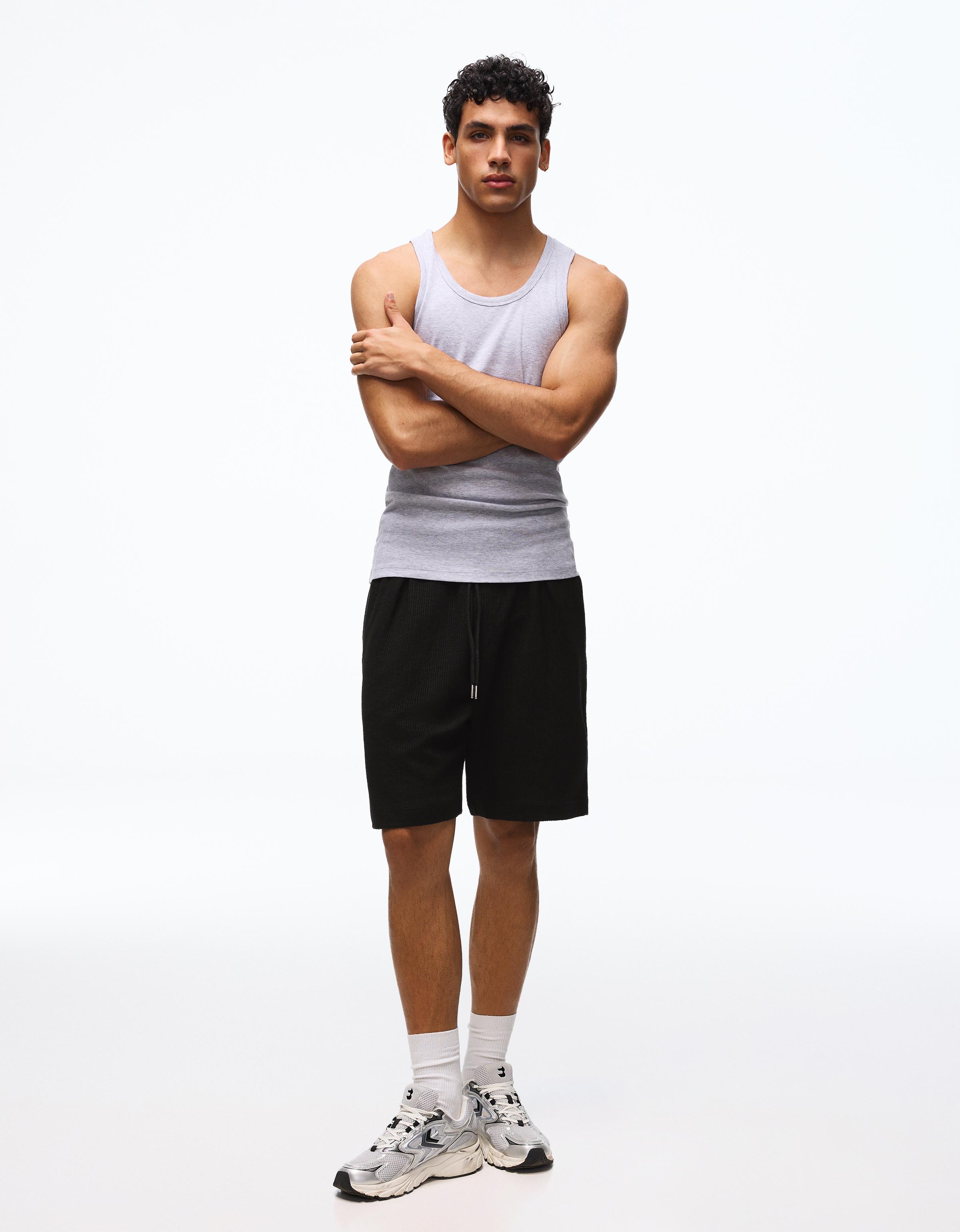 Textured plush Bermuda shorts — Black
