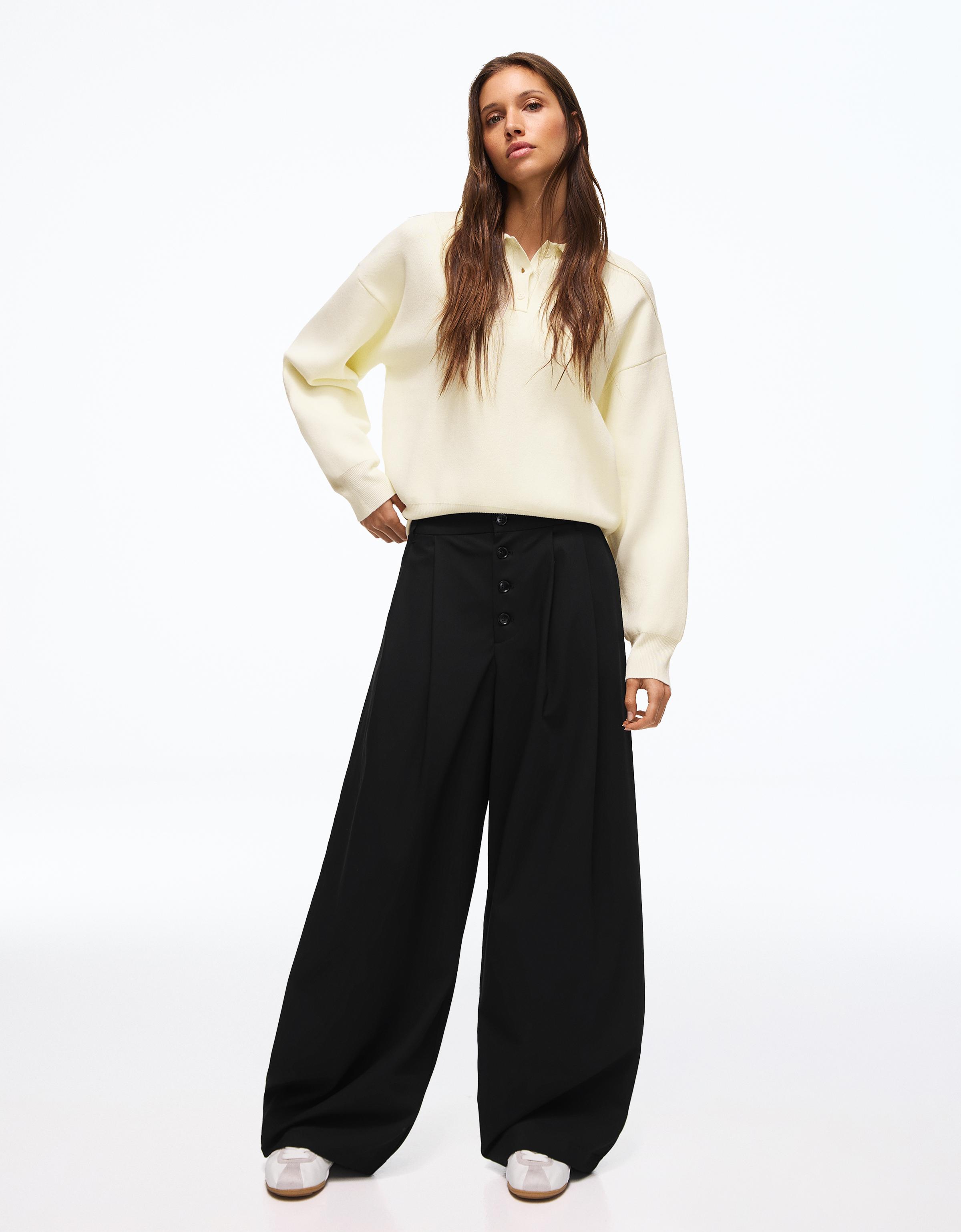 Balloon trousers with pleats and buttons
