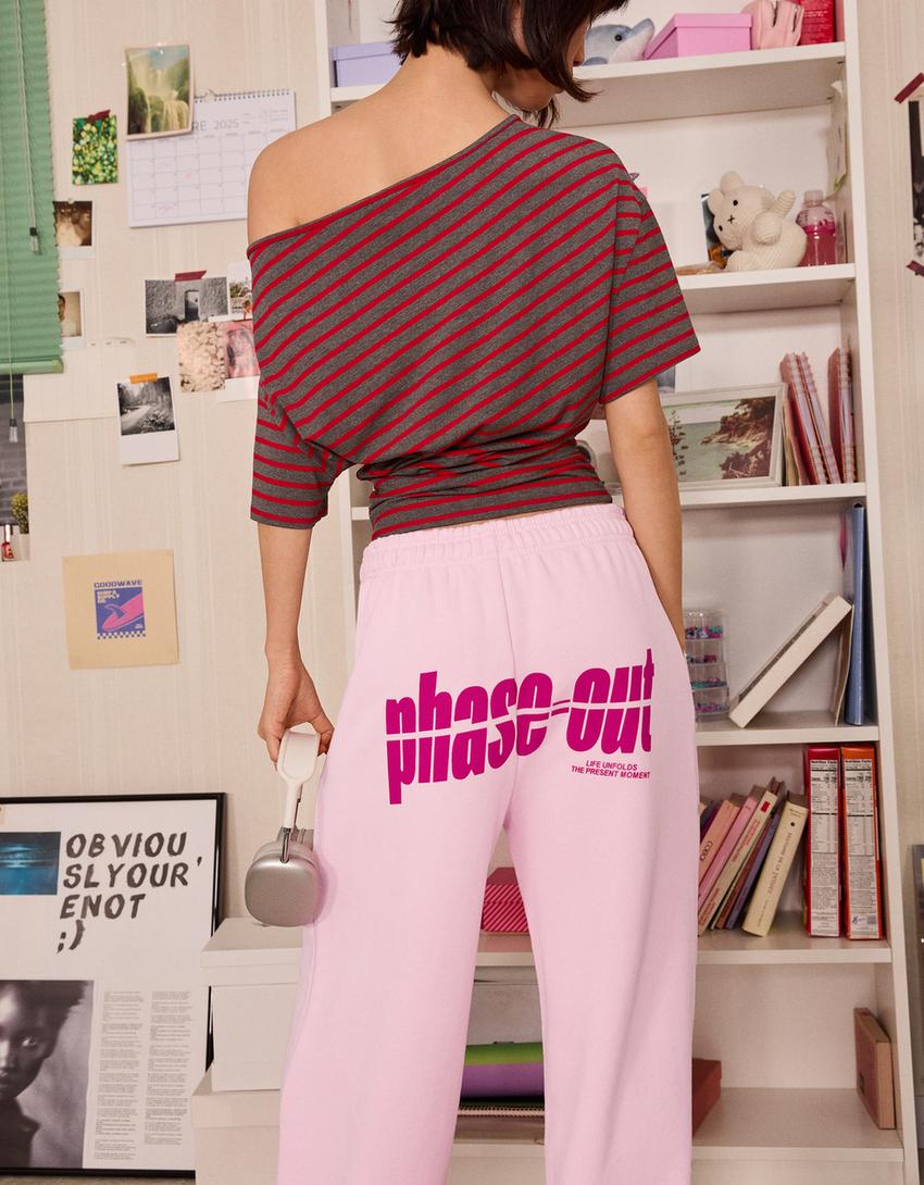 Teplákové kalhoty s potiskem a širokými nohavicemi-Růžová