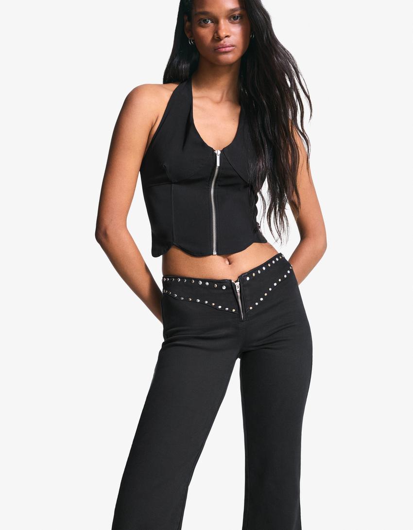Pantaloni con borchie in vita e cerniera-Nero-0